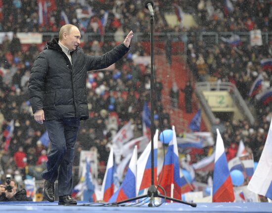 Putin speaks to his supporters at "Defend the Nation!" rally