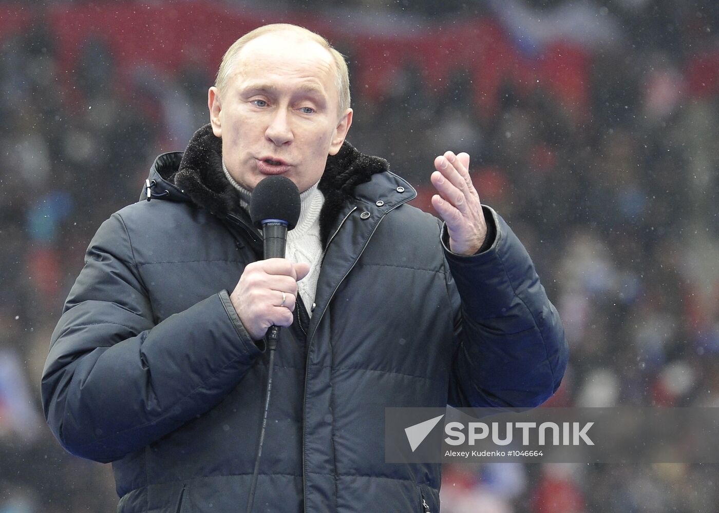 Putin speaks to his supporters at "Defend the Nation!" rally