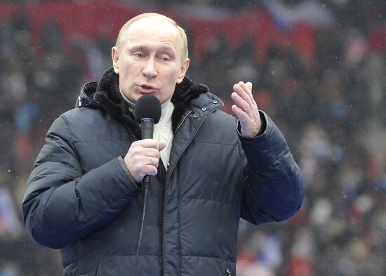 Putin speaks to his supporters at "Defend the Nation!" rally