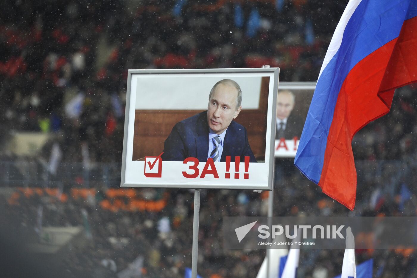 Putin addresses his supporters at "Defend the Nation!" rally