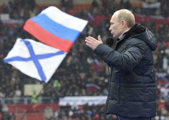 Putin addresses his supporters at "Defend the Nation!" rally