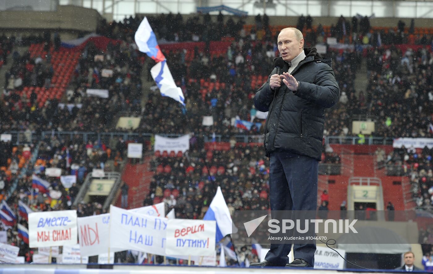 Putin addresses his supporters at "Defend the Nation!" rally