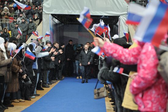 Putin speaks to his supporters at "Defend the Nation!" rally