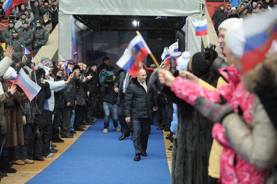 Putin speaks to his supporters at "Defend the Nation!" rally