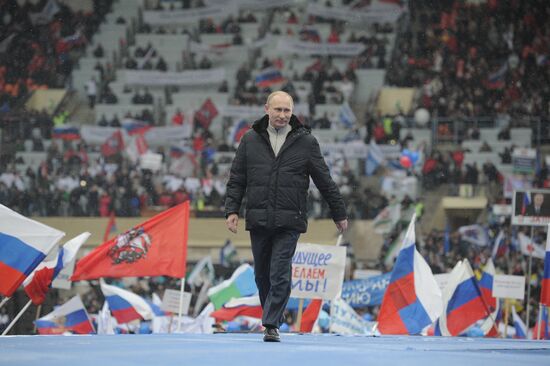 Putin addresses his supporters at "Defend the Nation!" rally