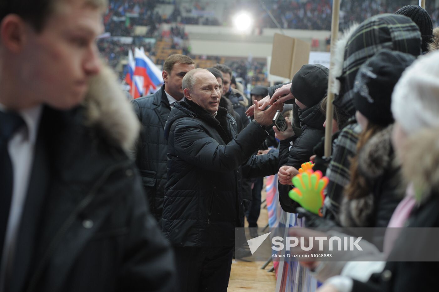 Putin addresses his supporters at "Defend the Nation!" rally