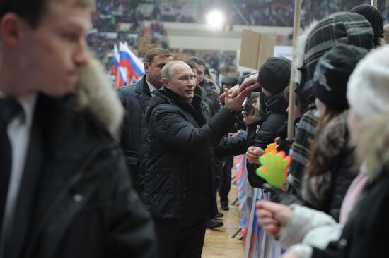 Putin addresses his supporters at "Defend the Nation!" rally