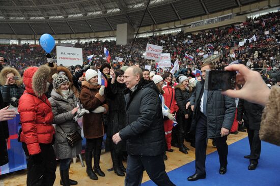 Putin speaks to his supporters at "Defend the Nation!" rally