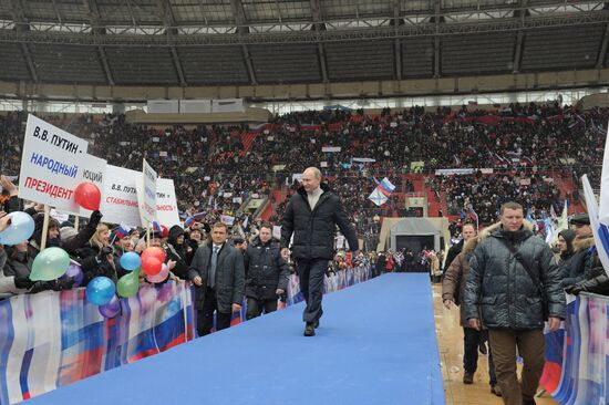 Putin addresses his supporters at "Defend the Nation!" rally
