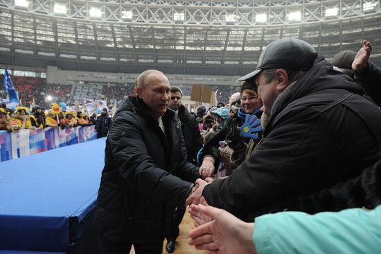 Putin addresses his supporters at "Defend the Nation!" rally