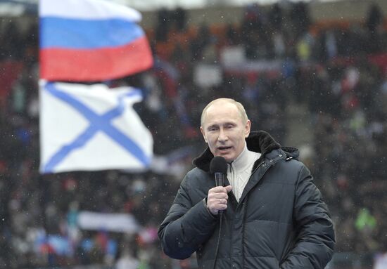 Putin speaks to his supporters at "Defend the Nation!" rally