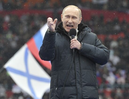 Putin speaks to his supporters at "Defend the Nation!" rally