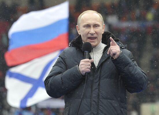 Putin speaks to his supporters at "Defend the Nation!" rally
