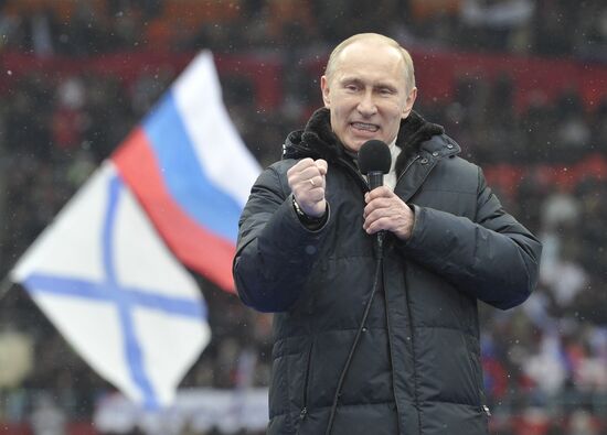 Putin speaks to his supporters at "Defend the Nation!" rally