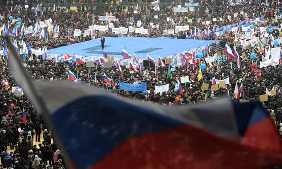 Putin speaks to his supporters at "Defend the Nation!" rally