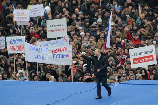 Putin speaks to his supporters at "Defend the Nation!" rally