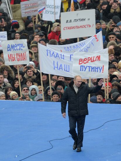 Putin speaks to his supporters at "Defend the Nation!" rally