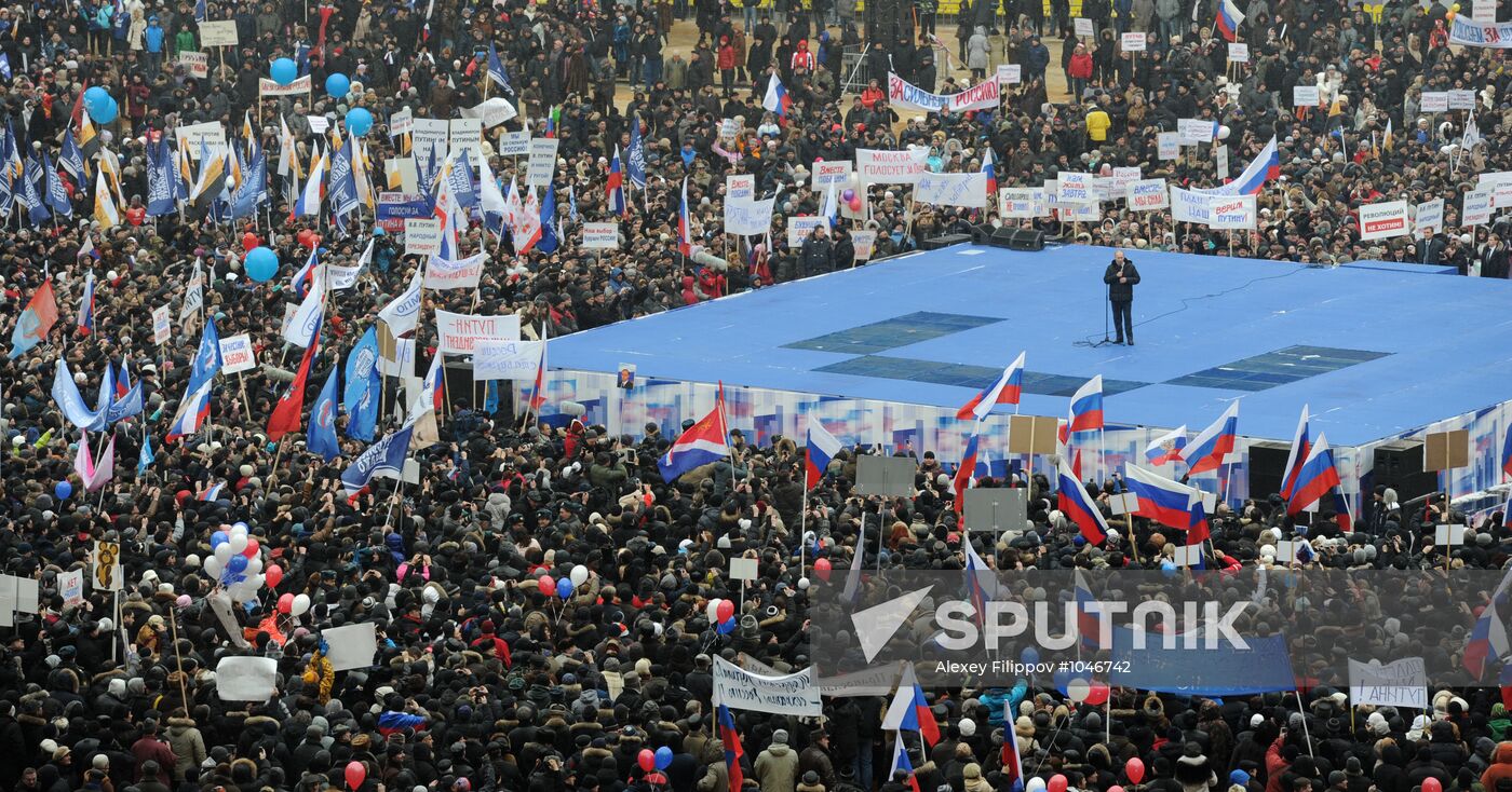Putin speaks to his supporters at "Defend the Nation!" rally