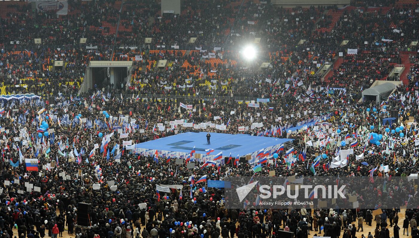 Putin speaks to his supporters at "Defend the Nation!" rally