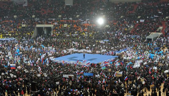 Putin speaks to his supporters at "Defend the Nation!" rally