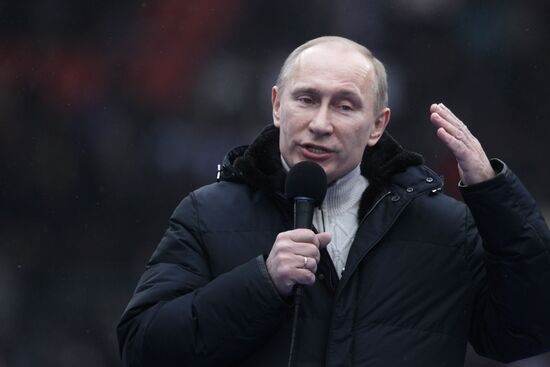 Putin speaks to his supporters at "Defend the Nation!" rally