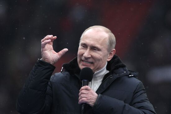 Putin speaks to his supporters at "Defend the Nation!" rally