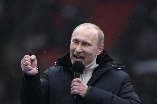 Putin speaks to his supporters at "Defend the Nation!" rally