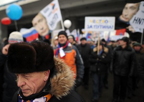 "Let's Defend Our Country!" march and rally in support of Putin