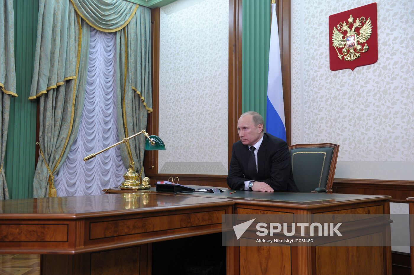 Russian Prime Minister Vladimir Putin holds telephone conference