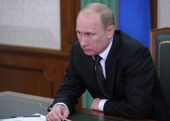 Russian Prime Minister Vladimir Putin holds telephone conference