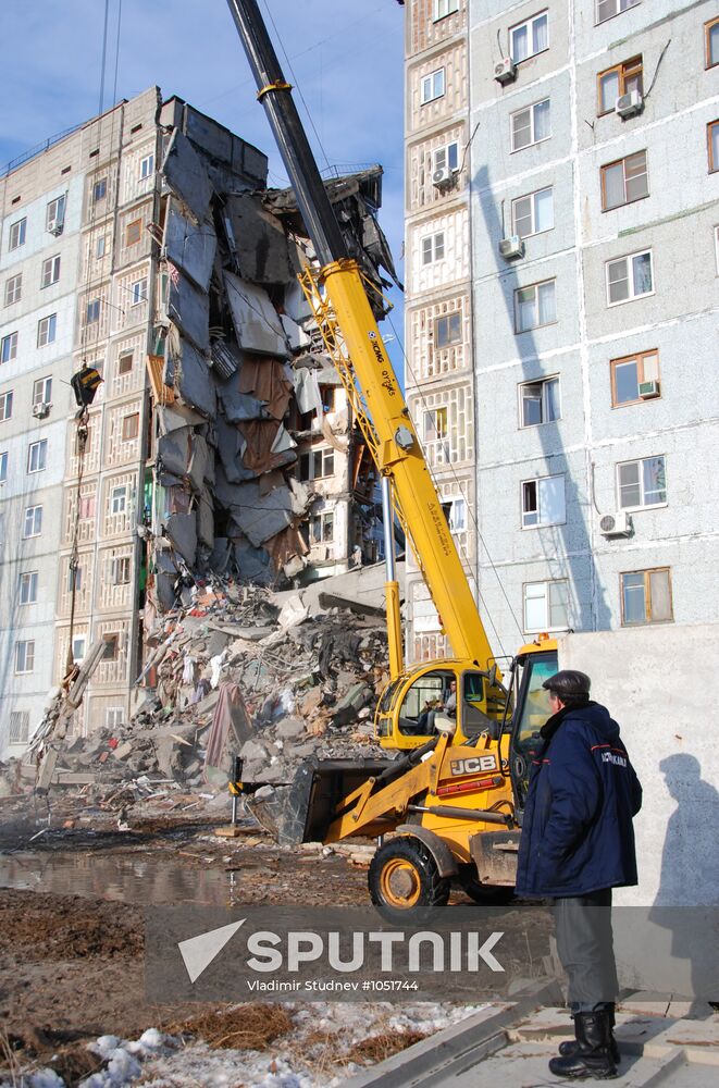 Clearing debris of collapsed apartment block in Astrakhan