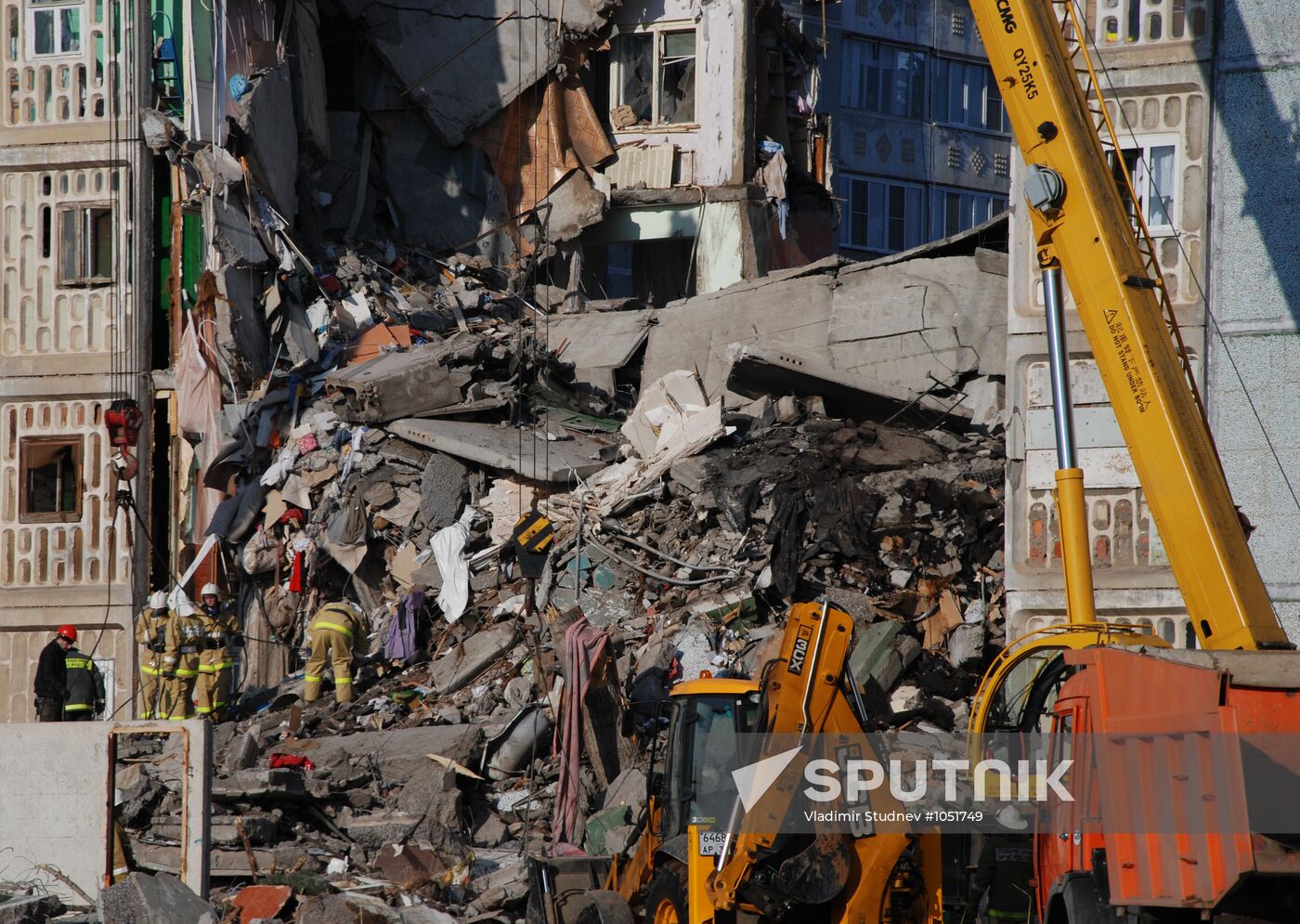 Clearing debris of collapsed apartment block in Astrakhan