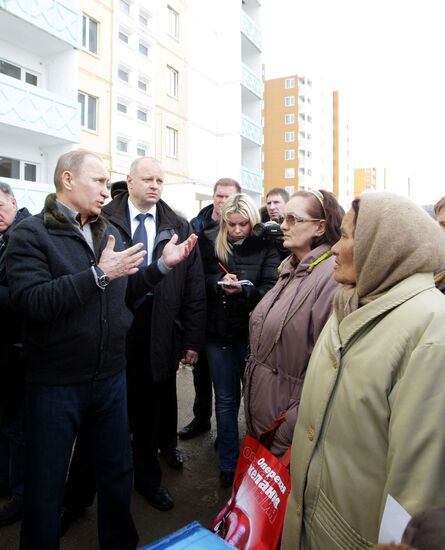 Vladimir Putin visits building collapse site in Astrakhan