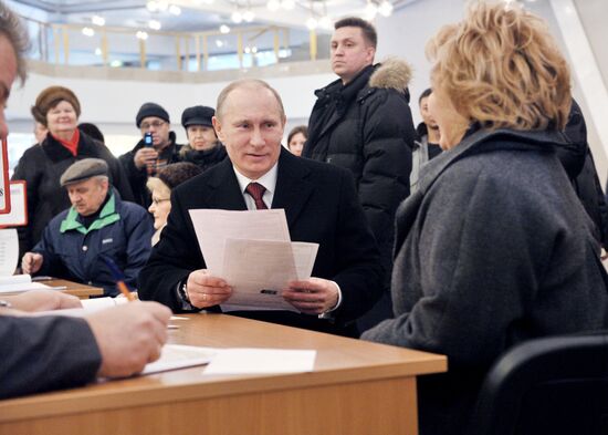 Vladimir Putin votes in Russian presidential election