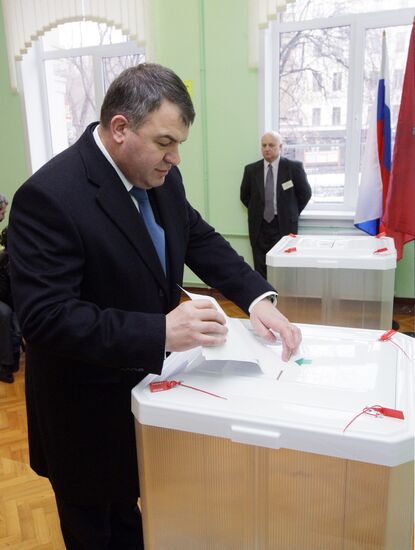 Defense Minister Anatly Serdyukov votes in presidential election