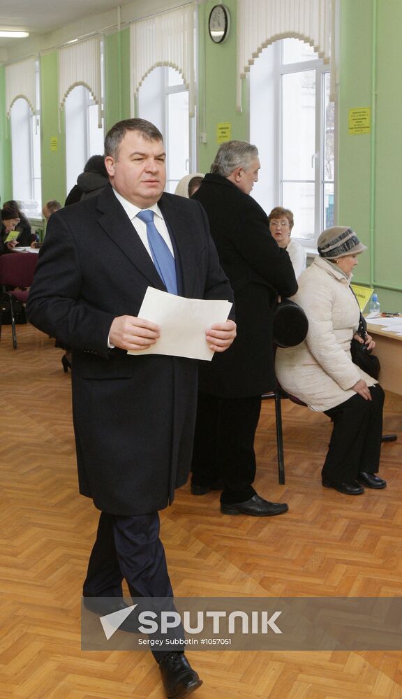 Defense Minister Anatly Serdyukov votes in presidential election