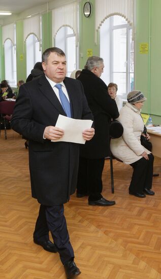 Defense Minister Anatly Serdyukov votes in presidential election