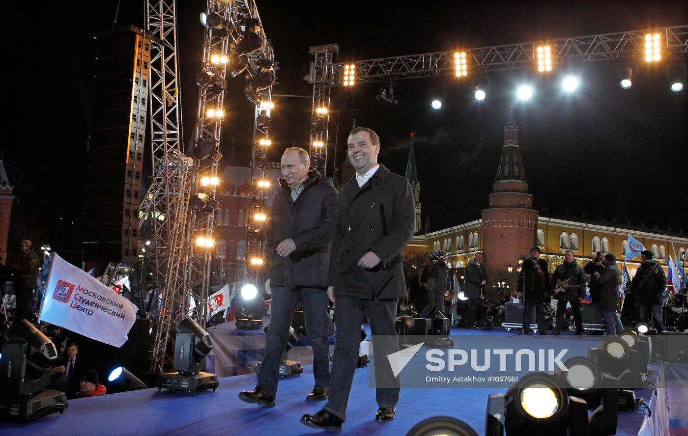 D. Medvedev and V. Putin appear at a rally on Manezh Square