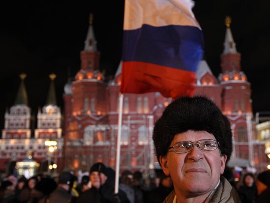 D. Medvedev and V. Putin appear at a rally on Manezh Square