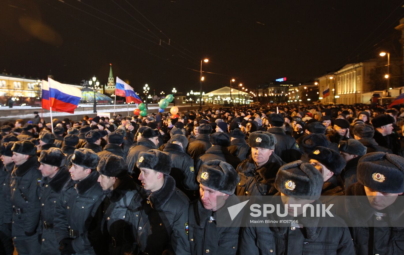 D. Medvedev and V. Putin appear at a rally on Manezh Square