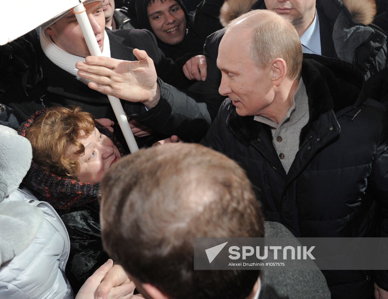 D. Medvedev and V. Putin appear at a rally on Manezh Square
