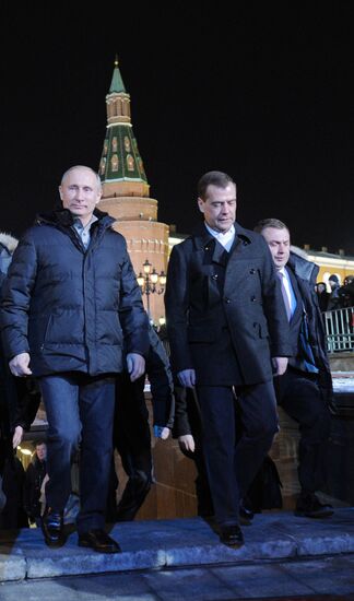 D. Medvedev and V. Putin appear at a rally on Manezh Square