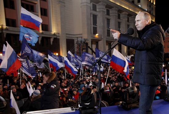 D. Medvedev and V. Putin appear at a rally in Manege Square