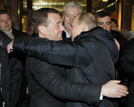 D. Medvedev and V. Putin appear at a rally in Manege Square