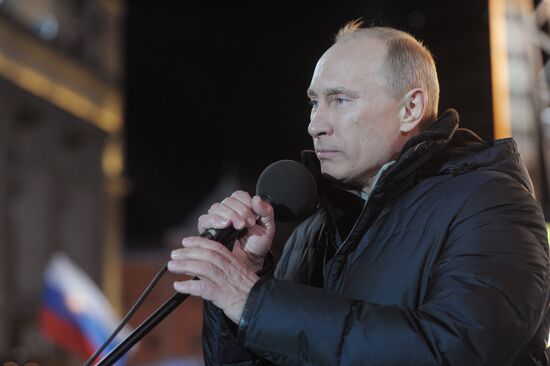 D. Medvedev and V. Putin appear at a rally in Manege Square