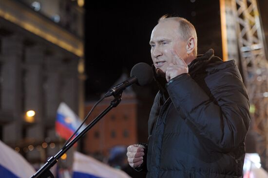 D. Medvedev and V. Putin appear at a rally in Manege Square