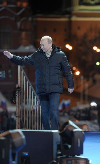D. Medvedev and V. Putin appear at a rally in Manege Square