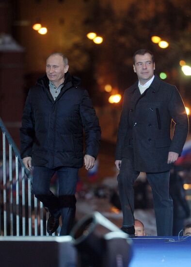 D. Medvedev and V. Putin appear at a rally in Manege Square