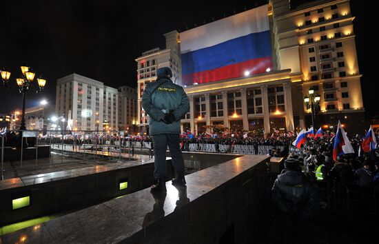 D. Medvedev and V. Putin appear at a rally on Manezh Square