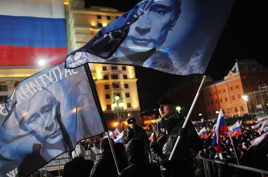D. Medvedev and V. Putin appear at a rally on Manezh Square